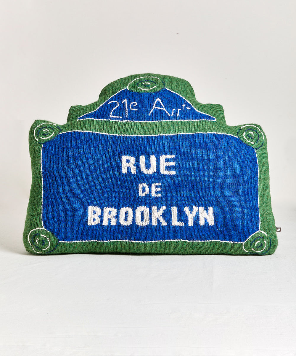 Rue de Brooklyn Pillow: A green and blue design resembling a street sign with "21e Arrt" and "Rue de Brooklyn.