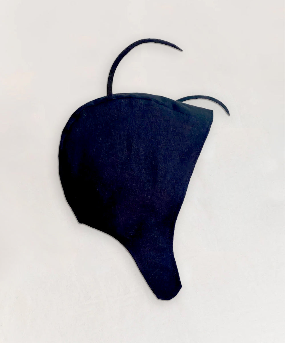 A Le Antennae Hat, black with strings, on a white background.