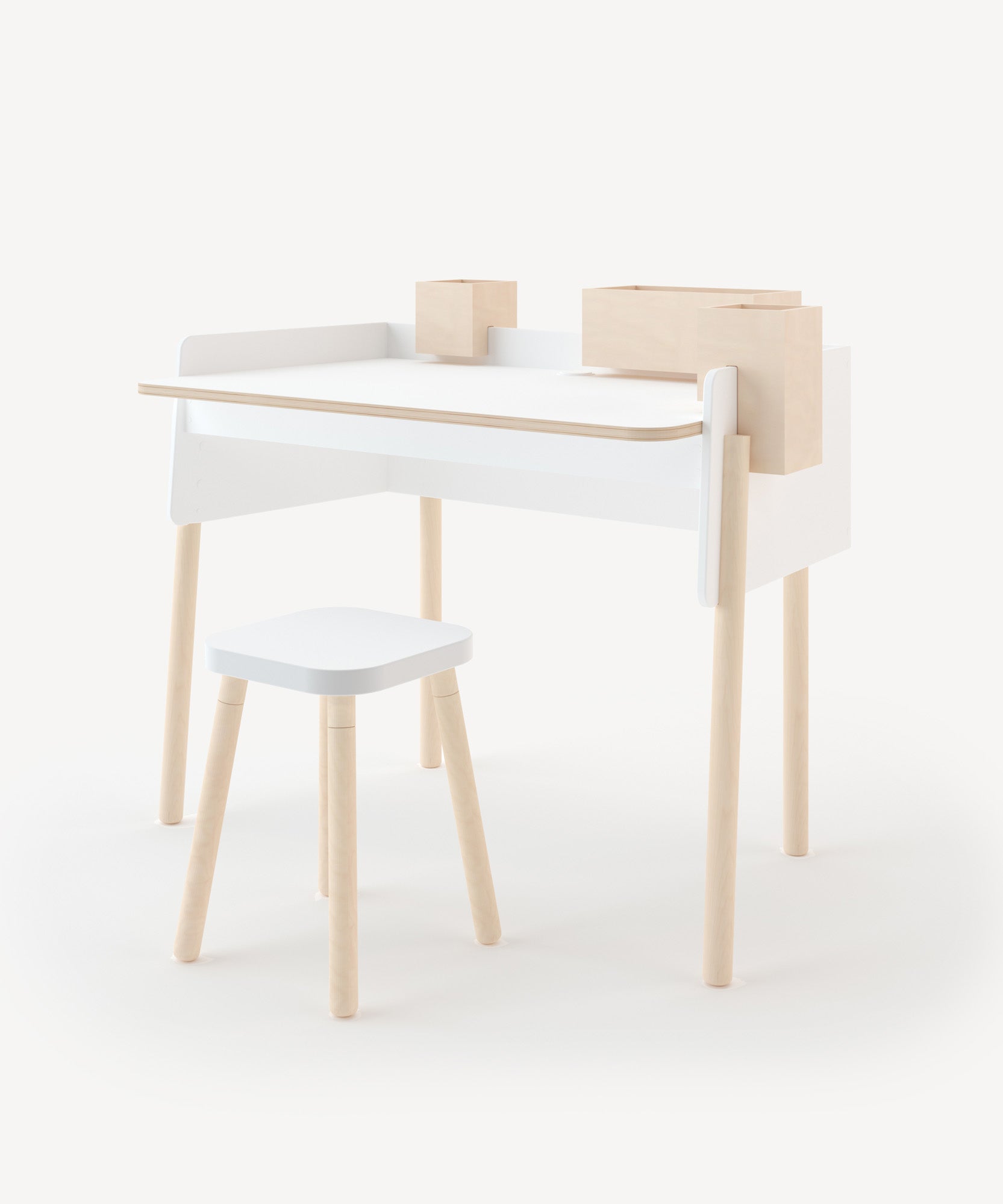 The Brooklyn Desk features a minimalist design in white and wood, accompanied by a matching stool, set against a white background.