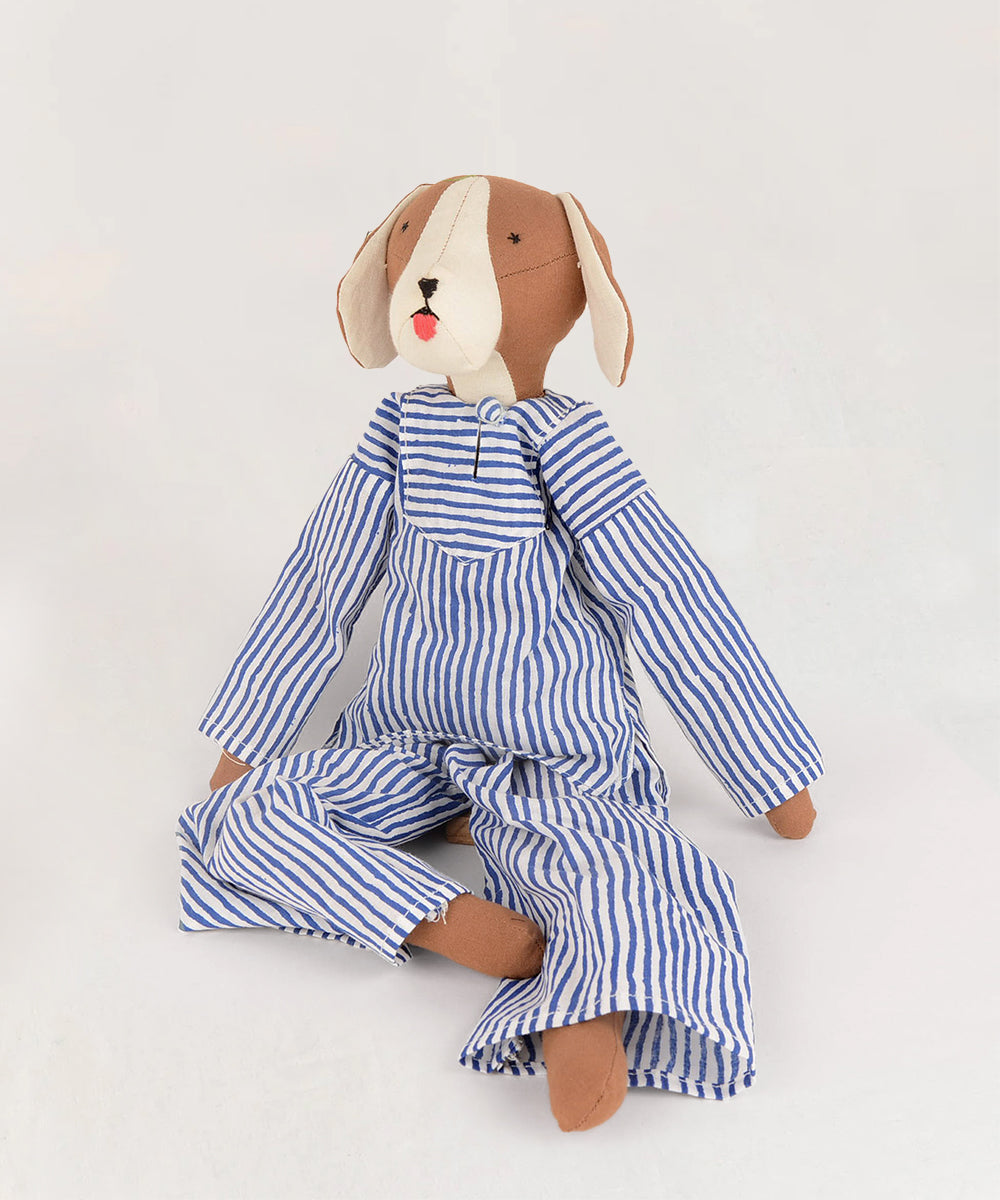 The Le Doggy fabric toy sits upright wearing blue and white striped pajamas against a plain background.