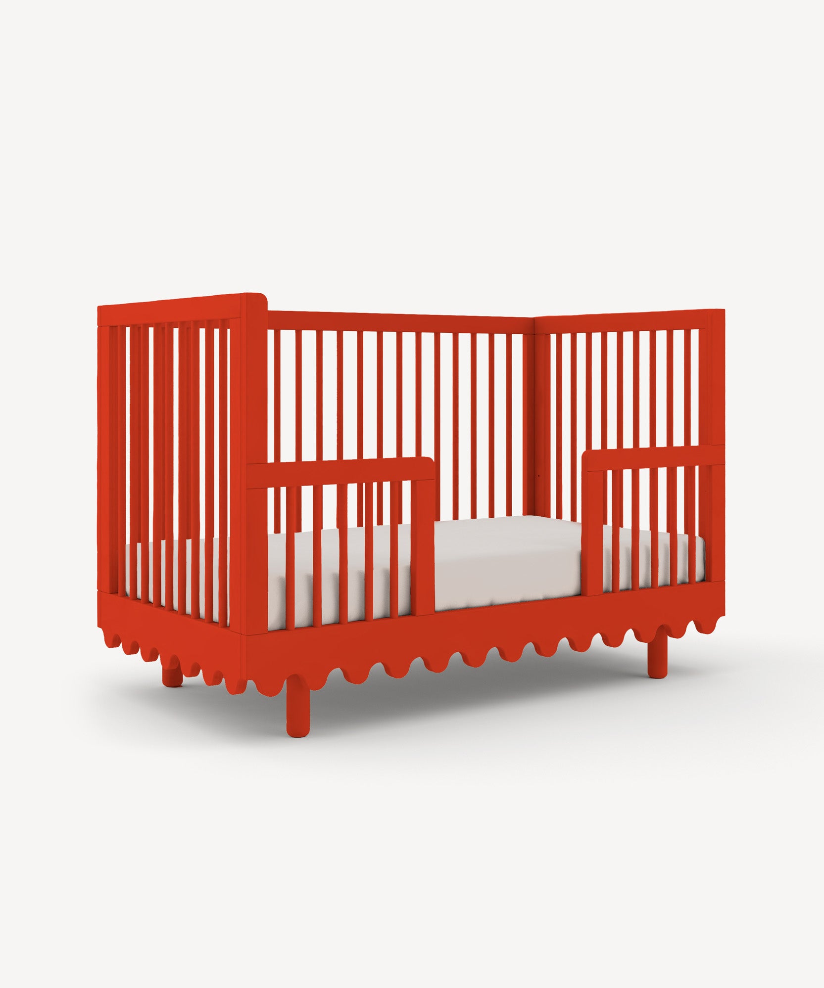 Moss Crib Conversion Kit in red features a wavy base design and white mattress, shown against a plain light background.