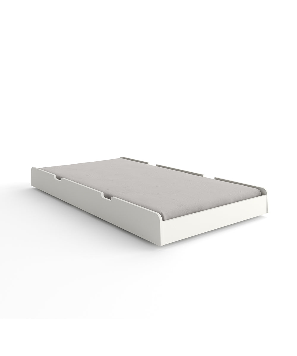 Trundle Mattress in gray on a white trundle bed, set against a plain white backdrop.