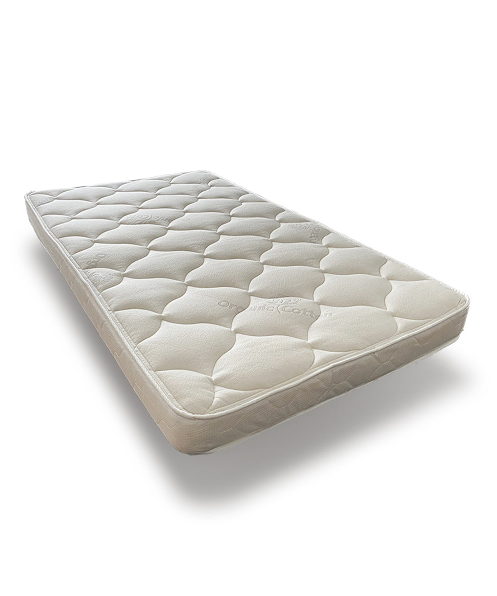 Trundle Mattress with a quilted white design, soft texture, and rounded edges, shown at an angle on a plain background.